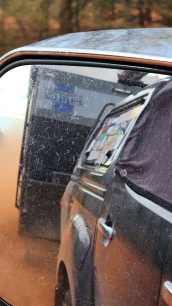 Vehicle in dust. Dust reduction working in the Van Cruiser van says happy customer 