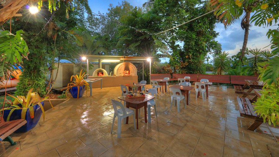 large patio with seating late in the day